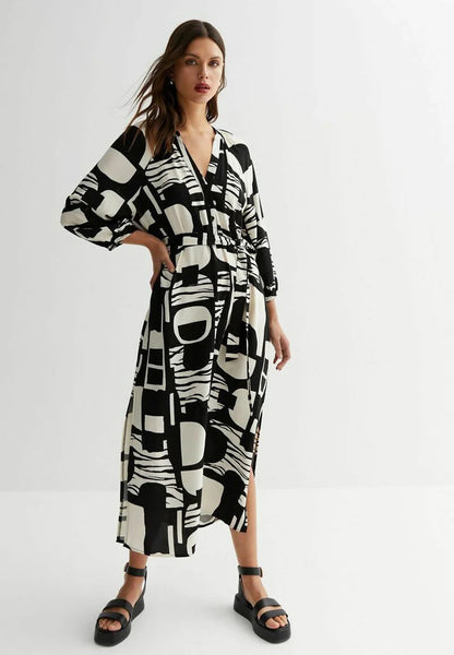 Monochrome Muse Wrap Dress – Black & Ivory Geometric Print
