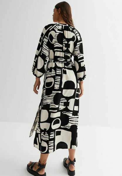 Monochrome Muse Wrap Dress – Black & Ivory Geometric Print