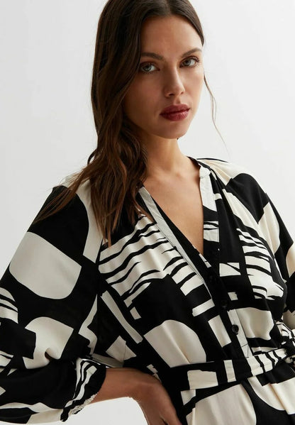 Monochrome Muse Wrap Dress – Black & Ivory Geometric Print